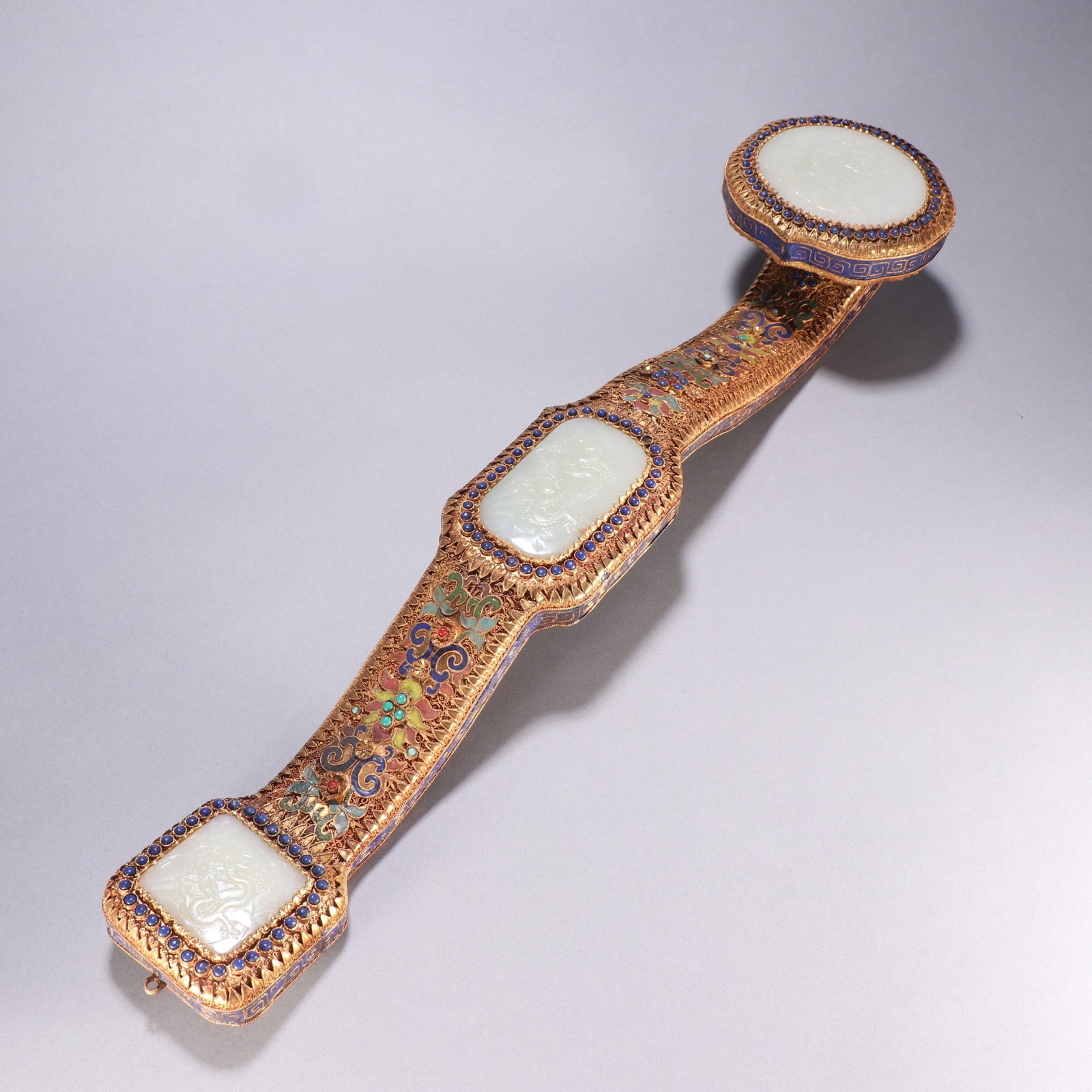 A fine Qing Dynasty silver-gilt Hetian jade dragon-patterned Ruyi scepter (1 of 8)