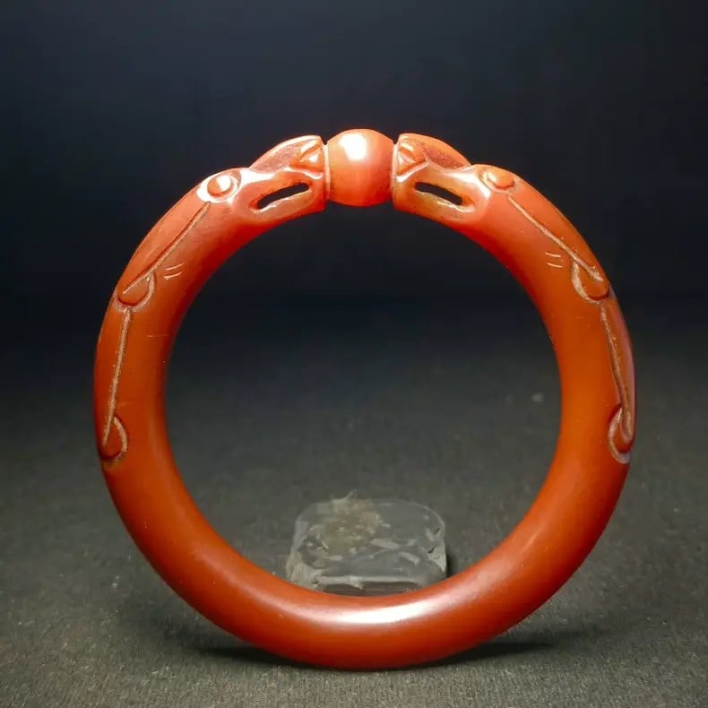 A beautiful Ming Dynasty southern red agate full-flesh persimmon red double dragon playing with a (1 of 4)