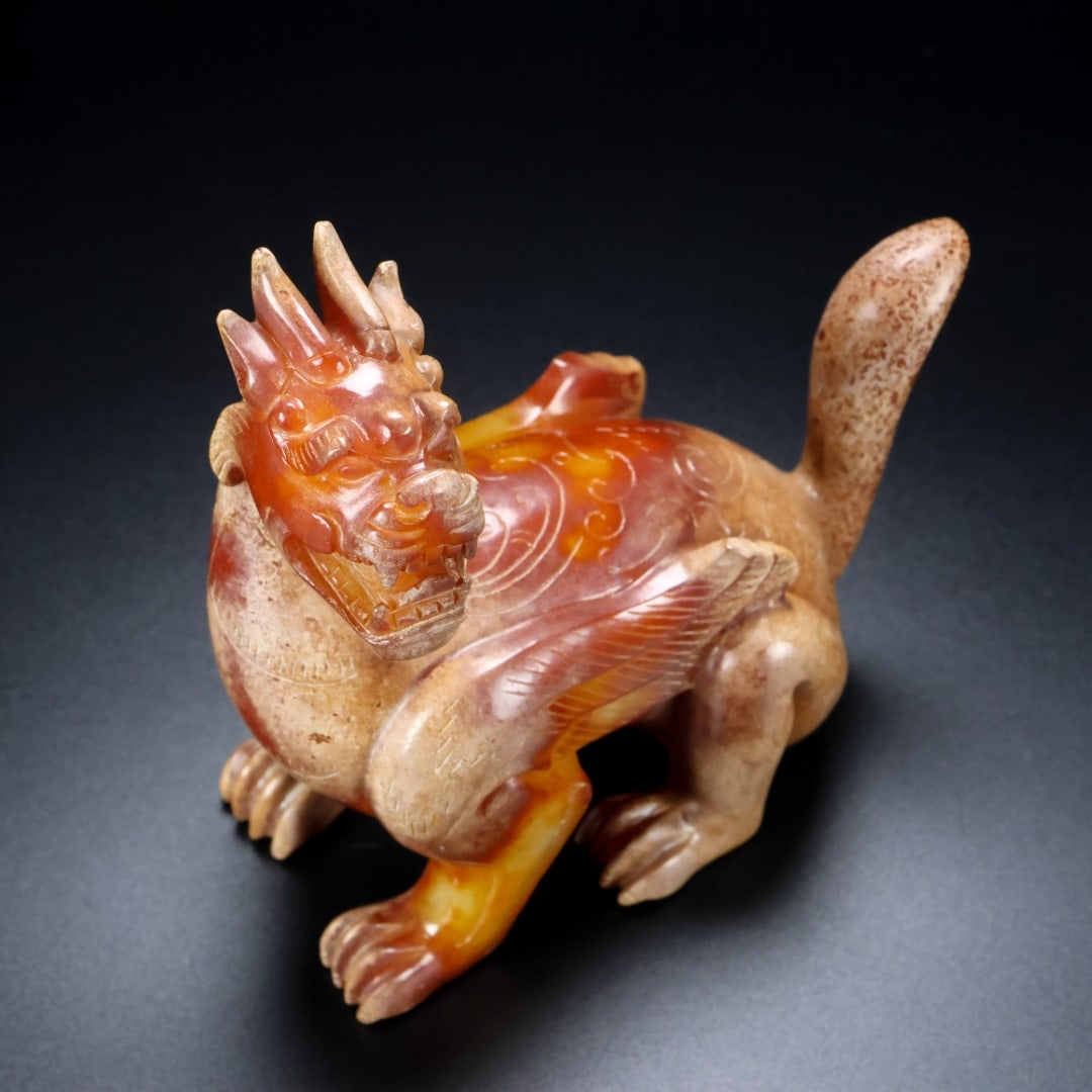 A fine Han Dynasty Hetian jade beast (1 of 9)