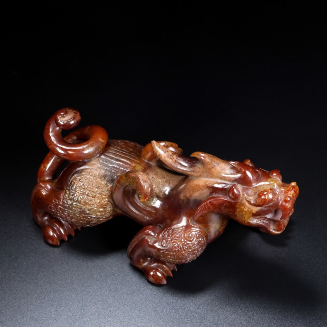 A fine Han Dynasty Hetian jade beast (1 of 9)