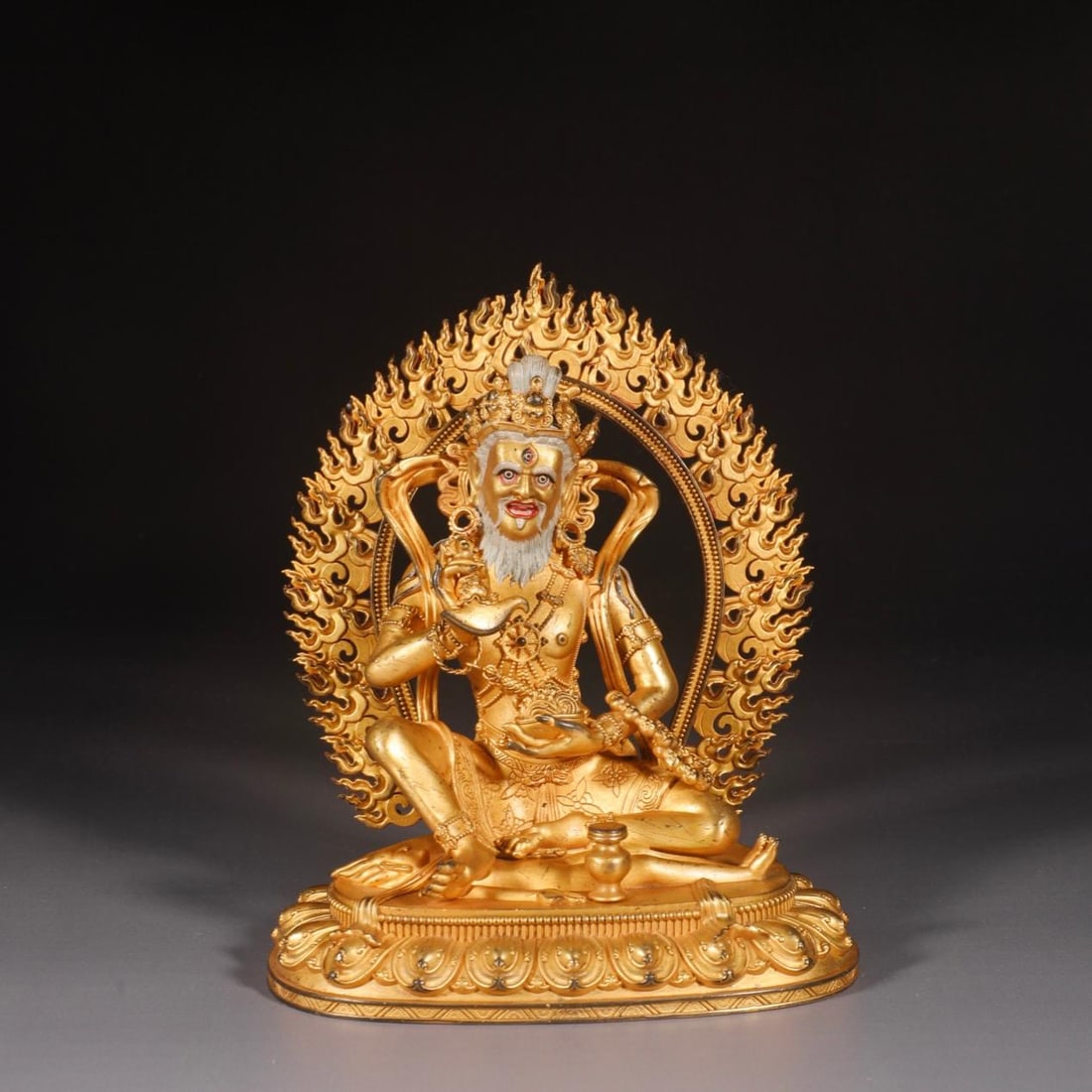 A fine Ming Dynasty fine-cast bronze-bodied gilded seated statue of a great accomplishment (1 of 9)