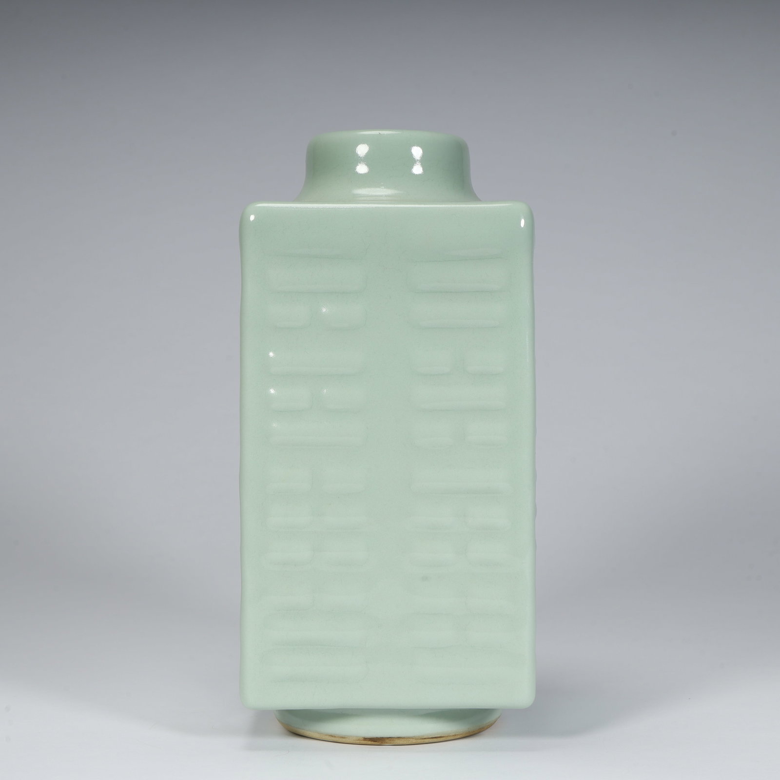 A fine Qing Dynasty Qianlong mark bean-green glazed Bagua cong-style vase (1 of 9)