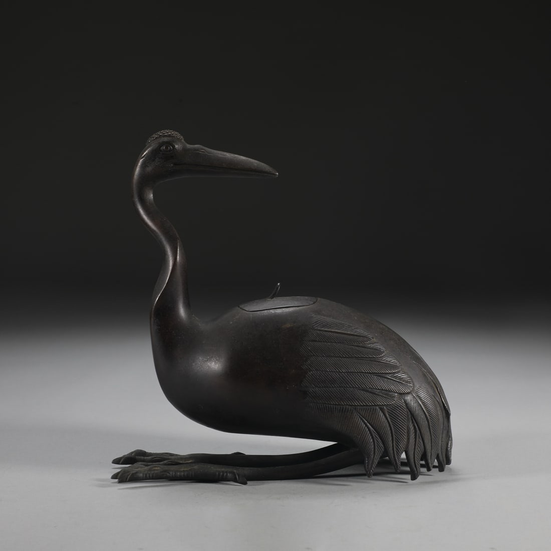 A fine Ming Dynasty bronze-inlaid crane incense burner: Ming Dynasty finely cast bronze-bodied crane incense burnerSIZE:H:18.5cm W:19cm W:1100g(The Dimensions Of All Batches Are Manually Measured.If You Need More Detailed Information, Please Contact Our Cu
