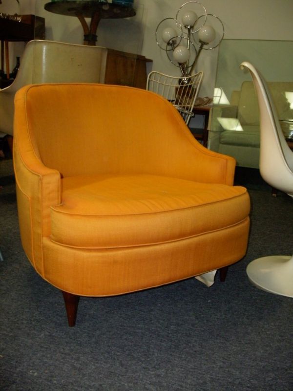 RETRO MODERN DESIGN SELIG LOW FORM LOUNGE CHAIR: NICE LOW FORM SIDE CHAIR IN A ELETRIC ORANGE FABRIC ON 4 SMALL TAPERED WALNUT LEGS DANISH SHAPE AND STYLE 28 X 33 X 30 1/2 INCHES MARKED WITH SELIG LABEL
