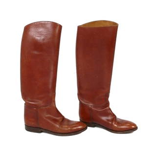 Vintage Hermes Leather Riding Boots: Vintage Hermes leather riding boots. They measure 9.75" from heel to toe, 3.5"W at widest points, and 17" overall height. The following clothing and couture lots are from the personal collection of Do