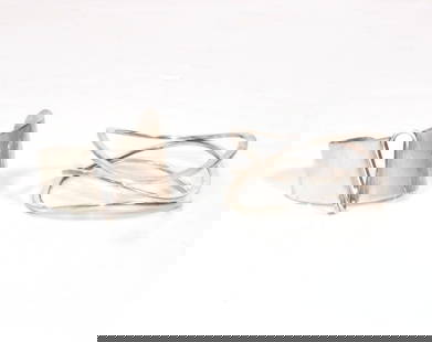 Two Modernist Sterling Silver Bracelets Cuffs From The Estate of Jackie Roger NYC Fashion Designer: Two Modernist Sterling Silver Bracelets or Cuffs, circa 1950s From The Estate of Jackie Rogers, Famous NYC Fashion Designer. The open bracelet is by Paul Lobel, the closed bracelet is by Ronald Hayes