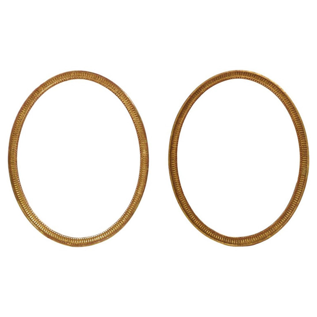 Pair of Oval Gilt Wood Mirrors From The Carlyle Hotel NYC: Pair of Oval Gilt Wood Mirrors, recently removed from The Carlyle Hotel, as they "modernized" and removed many items that don't have a "modern" look. They measure 28.75"H x 38.75"W x 2"D. This is your