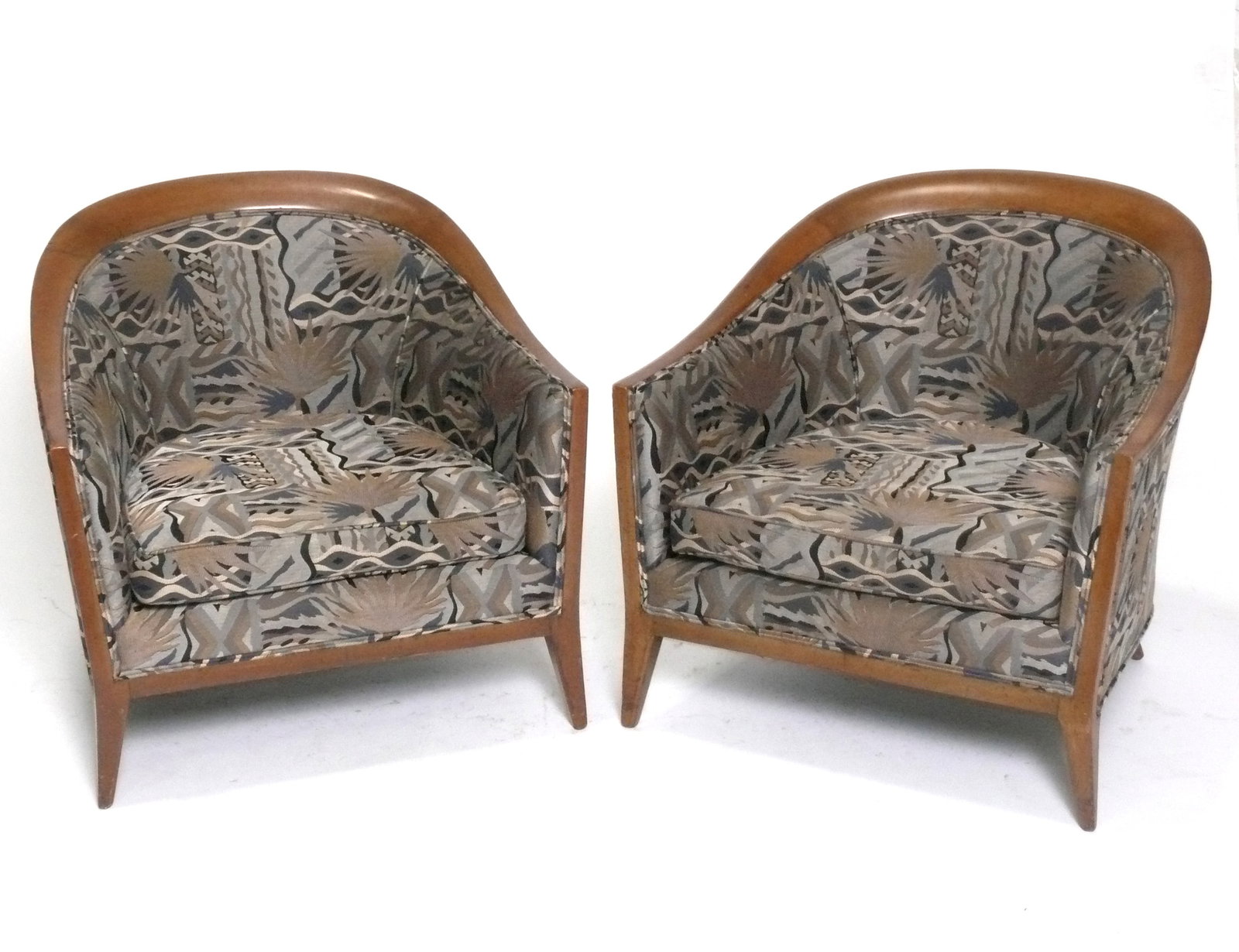 Curvaceous Tub Chairs by Widdicomb: Pair of curvaceous tub chairs, made by Widdicomb, circa 1960s. 28"H x 24"W x 24"D x 13" seat height. Furniture items are too large to ship via a common carrier like UPS or FedEx. They will need to go 