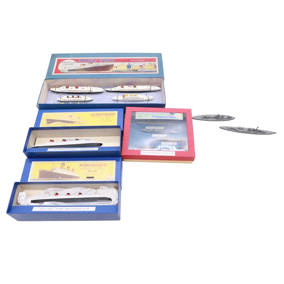 Sixteen Dinky waterline ship models: Sixteen Dinky waterline ship models, including ref. 52C 'La Normandie'; ref. 52 'Queen Mary'; ref. 51 'Famous Liners', and others Qty: 16