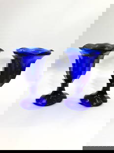 Pair of Vintage Cobalt Blue Glass Trumpet Vases: This pair of vintage cobalt blue glass vases features a trumpet-shaped silhouette with elegant curves and a rich, vibrant hue. Ideal for use as small bud vases, dessert cups, or decorative display pie