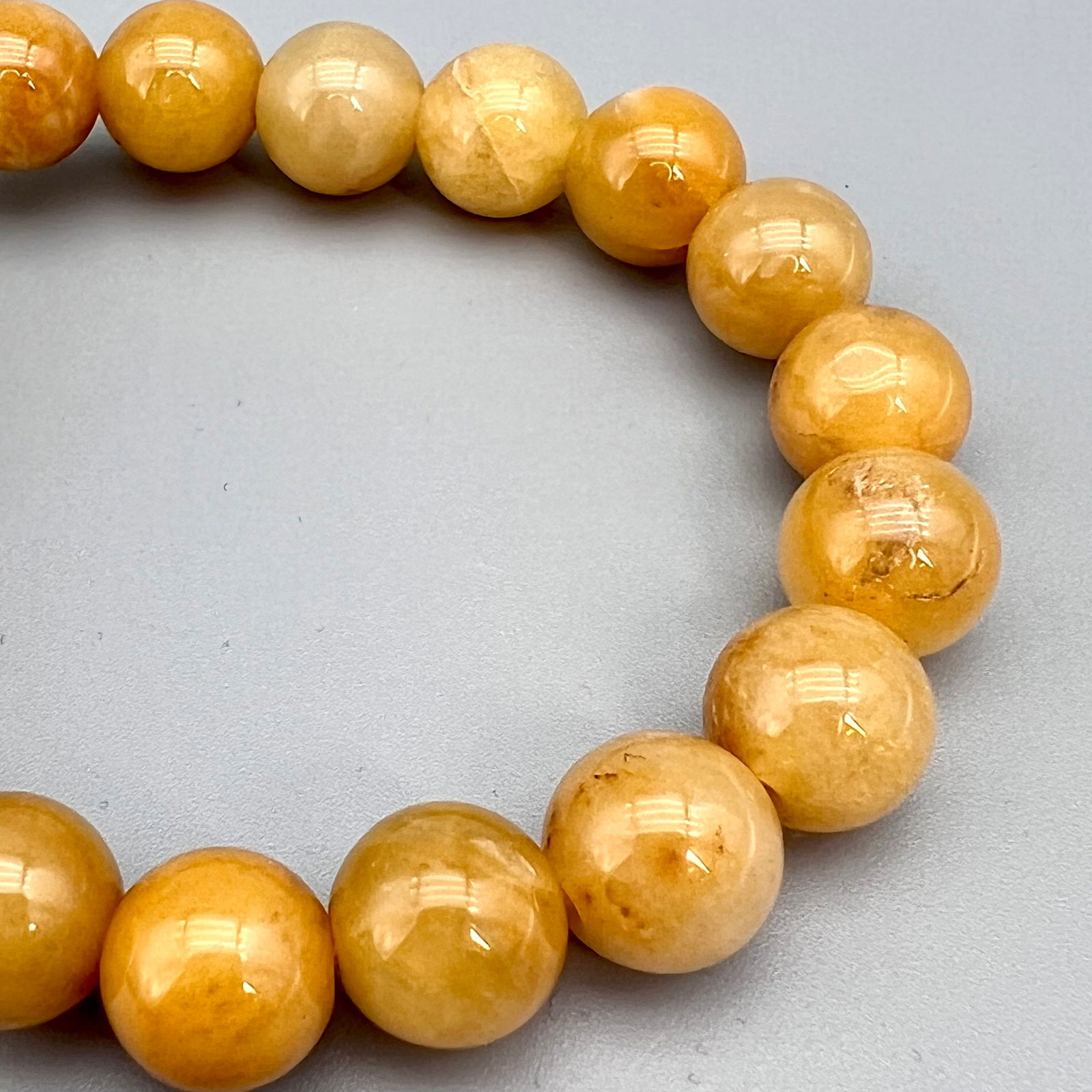 Yellow Jade-Like Bead Bracelet with Hand Carved Pi Xiu Amulet (1 of 3)
