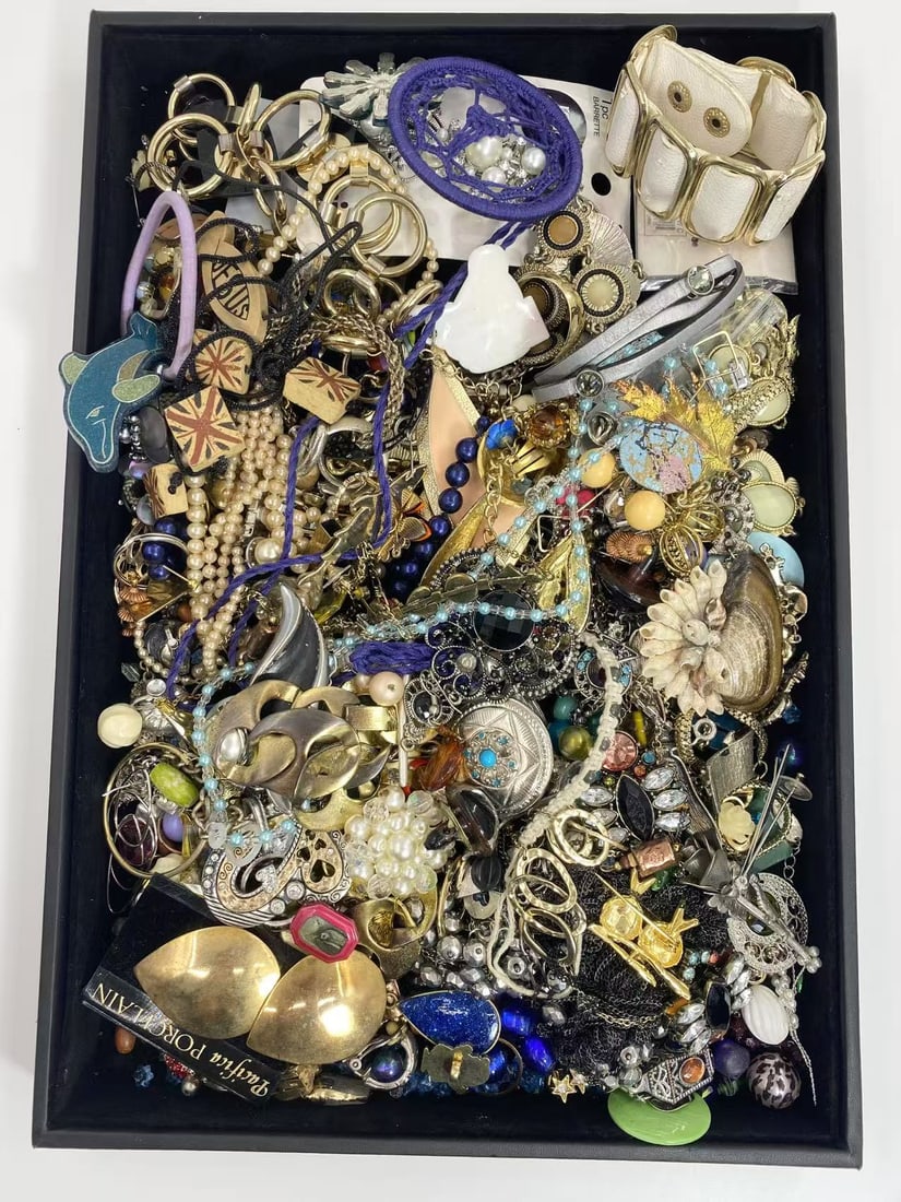 4 LB Unsearched Lot (As-Is, Tray Not Included): Assorted costume jewelry lot including necklaces, bracelets, earrings, pendants, and beaded pieces in various materials and styles. Contents are unsearched, unexamined, and untested, and are sold as-i