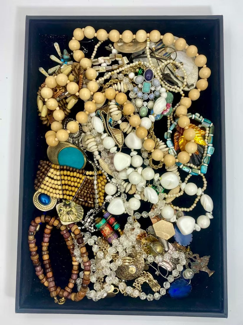 1 LB Unserached Jewelry Lot (As-Is, Tray Not Included): Assorted costume jewelry lot including necklaces, bracelets, earrings, pendants, and beaded pieces in various materials and styles. Contents are unsearched, unexamined, and untested, and are sold as-i