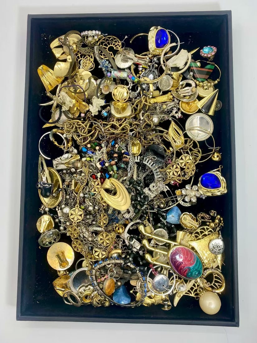 2 LB Unserached Jewelry Lot (As-Is, Tray Not Included): Assorted costume jewelry lot including necklaces, bracelets, earrings, pendants, and beaded pieces in various materials and styles. Contents are unsearched, unexamined, and untested, and are sold as-i
