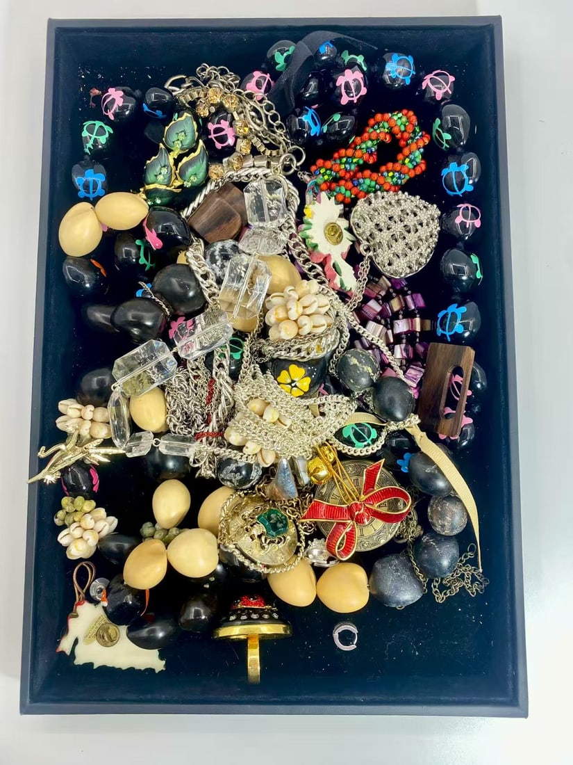 2 LB Unserached Jewelry Lot (As-Is, Tray Not Included): Assorted jewelry lot including necklaces, bracelets, earrings, pendants, and beaded pieces in various materials and styles. Contents are unsearched, unexamined, and untested, and are sold as-is. Items