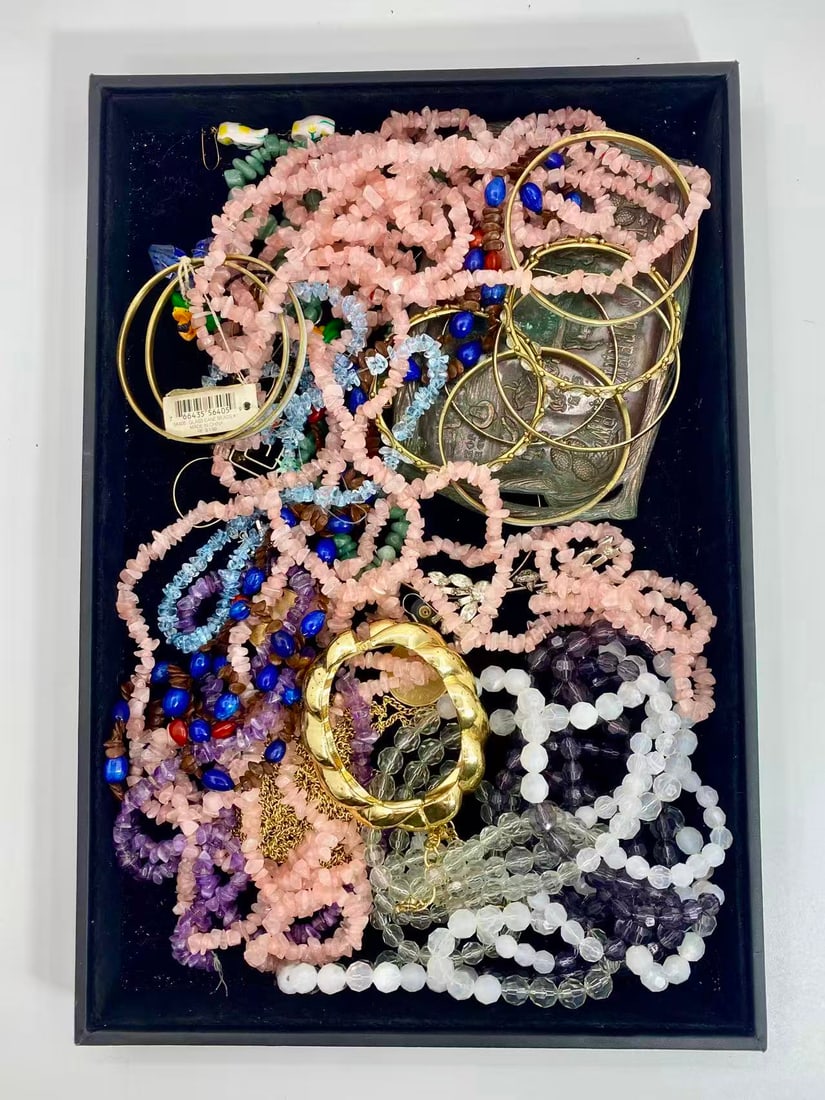2 LB Unserached Jewelry Lot (As-Is, Tray Not Included): Assorted jewelry lot including necklaces, bracelets, earrings, pendants, and beaded pieces in various materials and styles. Contents are unsearched, unexamined, and untested, and are sold as-is. Items