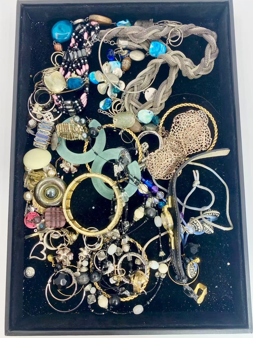 1 LB Unserached Jewelry Lot (As-Is, Tray Not Included): Assorted costume jewelry lot including necklaces, bracelets, earrings, pendants, and beaded pieces in various materials and styles. Contents are unsearched, unexamined, and untested, and are sold as-i