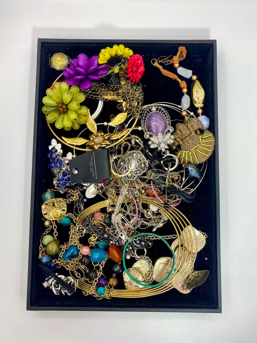 1 LB Unserached Jewelry (Unsearched / As-Is, Tray Not Included): Assorted costume jewelry lot including necklaces, bracelets, earrings, pendants, and beaded pieces in various materials and styles. Contents are?unsearched, unexamined, and untested, and are?sold as-i