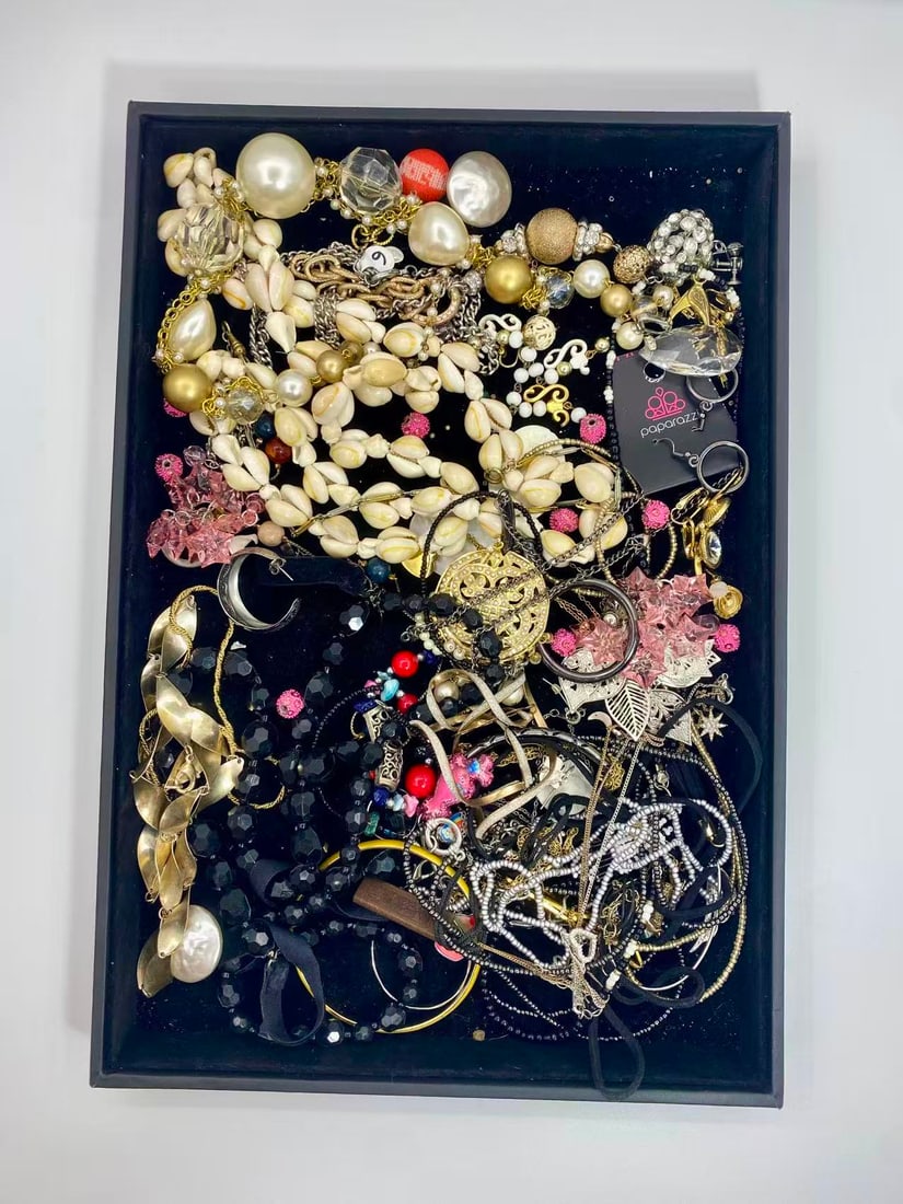 1 LB Unserached Jewelry (Unsearched / As-Is, Tray Not Included): Assorted jewelry lot including necklaces, bracelets, earrings, pendants, and beaded pieces in various materials and styles. Contents are?unsearched, unexamined, and untested, and are?sold as-is. Items