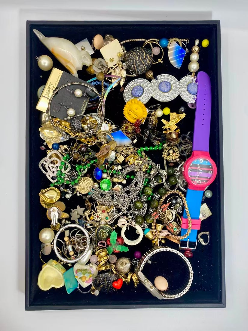 1 LB Unserached Jewelry (Unsearched / As-Is, Tray Not Included): Assorted jewelry lot including necklaces, bracelets, earrings, pendants, and beaded pieces in various materials and styles. Contents are?unsearched, unexamined, and untested, and are?sold as-is. Items