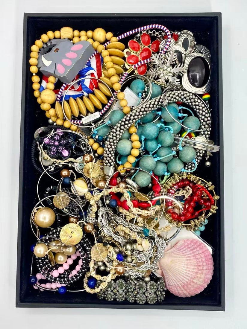 2 LB Unserached Jewelry (Unsearched / As-Is, Tray Not Included): Assorted jewelry lot including necklaces, bracelets, earrings, pendants, and beaded pieces in various materials and styles. Contents are?unsearched, unexamined, and untested, and are?sold as-is. Items