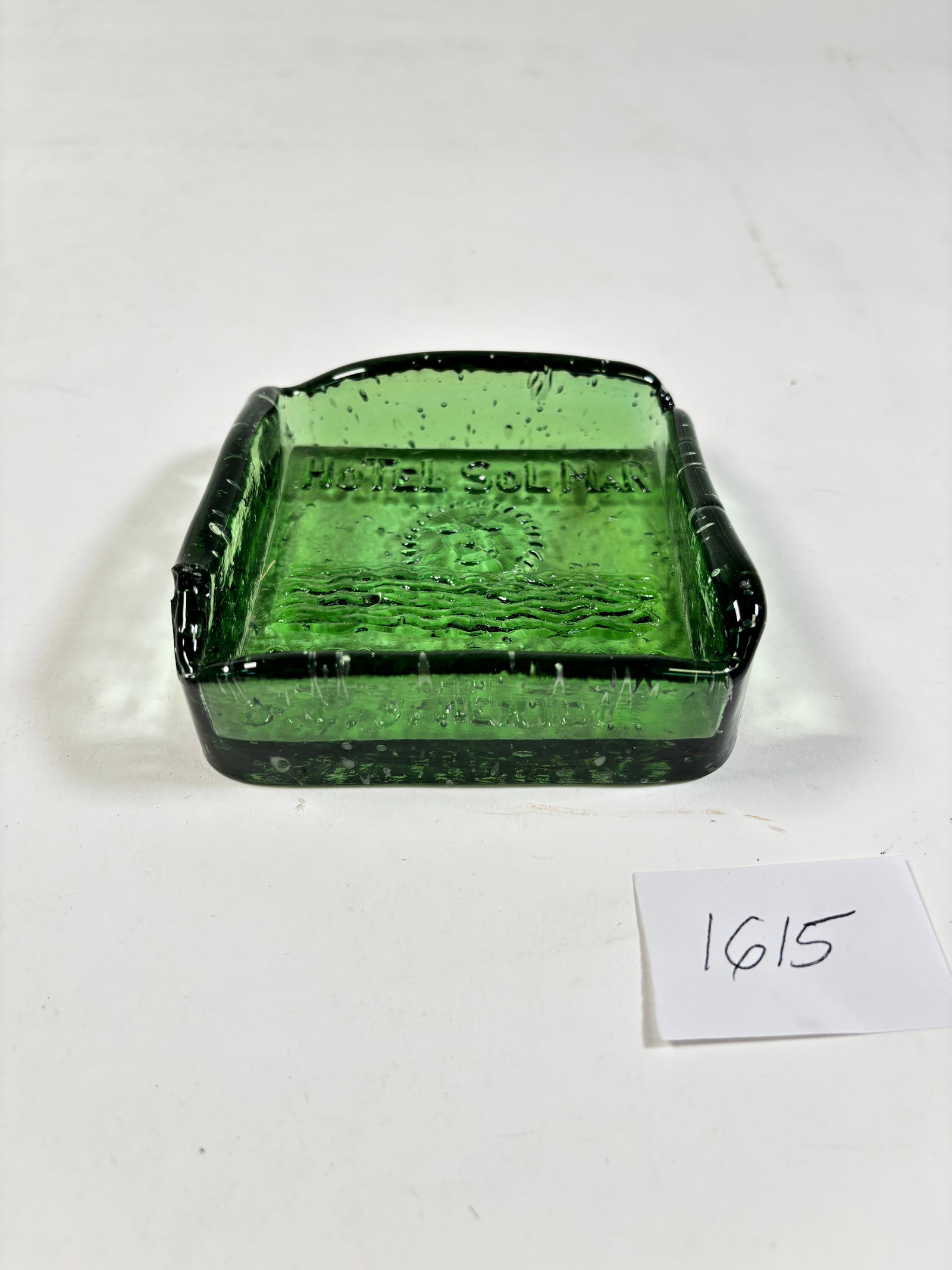 Vintage Hotel Sol Mar Cabo Green Ashtray: Vintage Hotel Sol Mar Cabo Green AshtrayClassic green ashtray from Hotel Sol Mar in Cabo. A great collectible piece with vintage charm. Please review photos for condition details