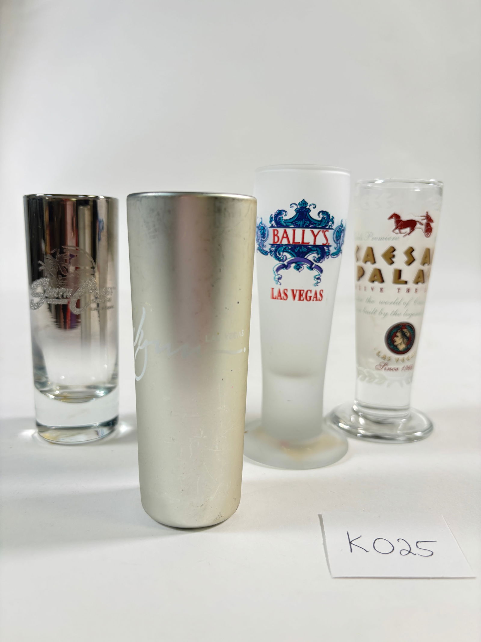 Vintage Shot Glasses Set of 4 (Souvenir Style: Las Vegas ): Vintage Shot Glasses Set of 4, featuring souvenir-style designs from Las Vegas and Casinos. Great for collectors. Refer to attached photos for details.