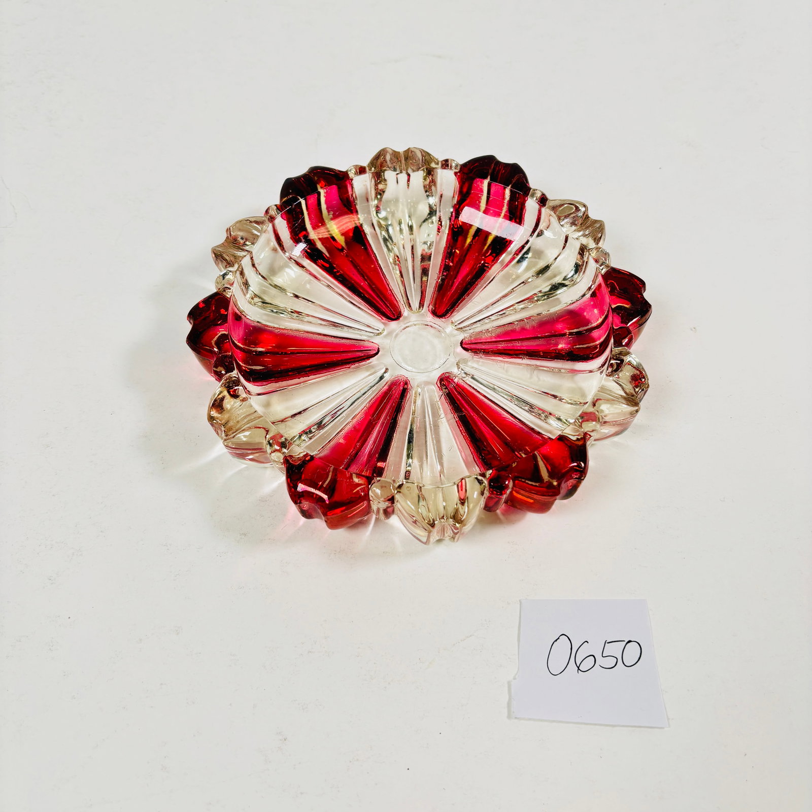 Vintage Hazel Atlas Cranberry Pink and Clear Ashtray: Vintage Hazel Atlas Cranberry Pink and Clear Ashtray. Elegant design with intricate cuts. See photos for details and condition. Sold as-is.
