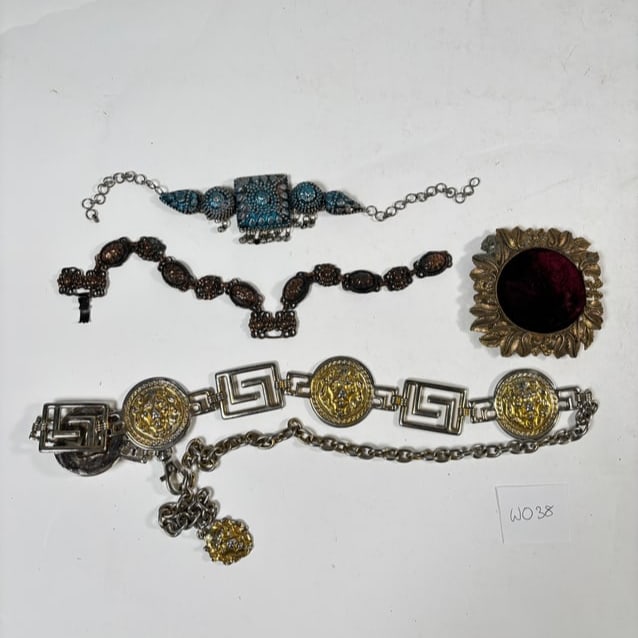 Assortment of Vintage Jewlery and Belt: A curated collection of vintage jewelry pieces and a belt, each showcasing unique designs and craftsmanship. Refer to attached photos for details
