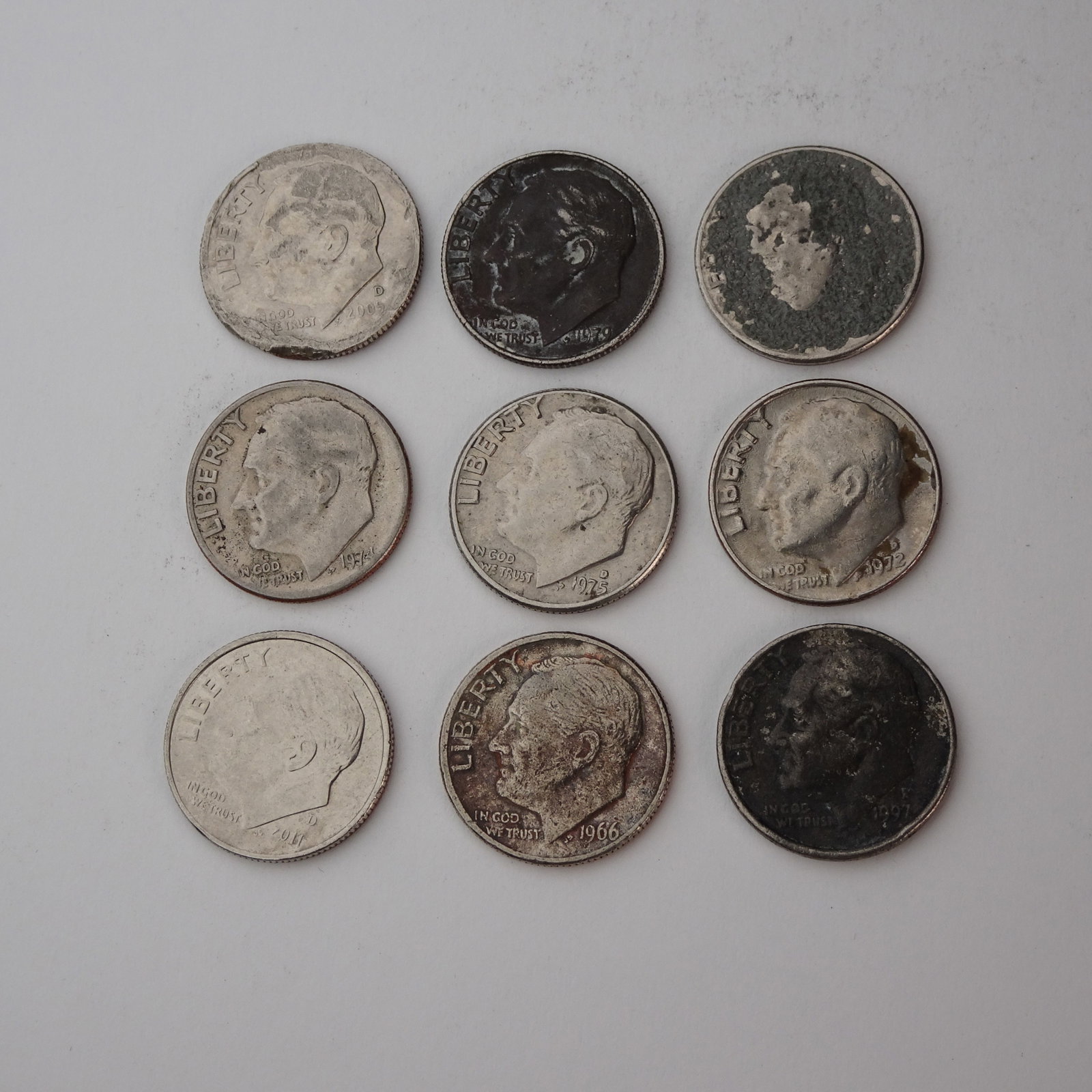 Assortment of USA Roosevelt Dimes Set of 9 (1966-2011): This listing is for an assortment of 9 USA Roosevelt Dimes, spanning various years from 1982 to 2007. This set offers a snapshot of circulating coinage from this era, perfect for starting a collection