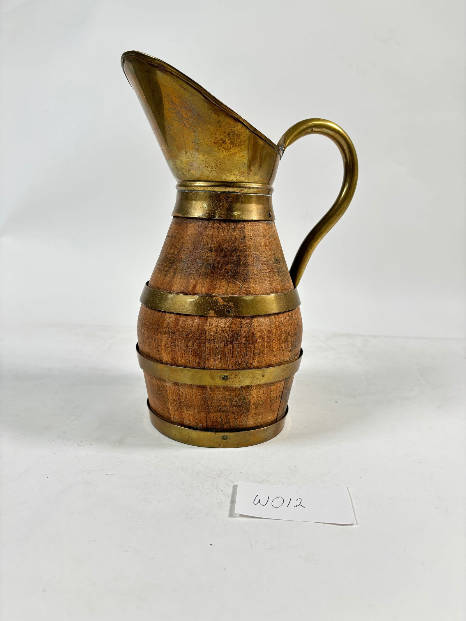 Antique French Victorian Handcrafted Cider Jug: Brass Cooperated Oak with Copper Sprout: Beautifully crafted Victorian-era cider jug made from oak, featuring brass coopered bands and a copper sprout. A unique piece showcasing French craftsmanship from the 19th century. Perfect for collect