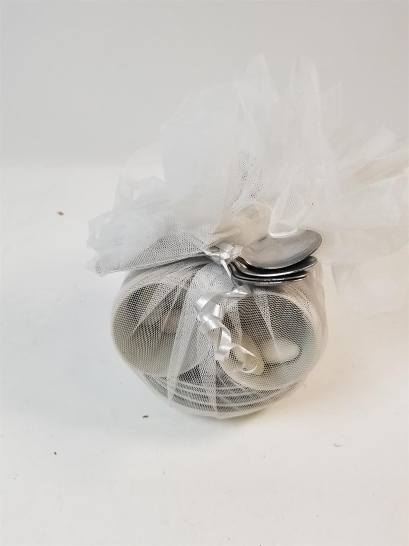 Tea Set of 4: Tea Set 4-Piece Collection with Spoons, Plates & Tea Cups Classic and elegant set for any tea lover. Condition varies; please refer to photos for details.