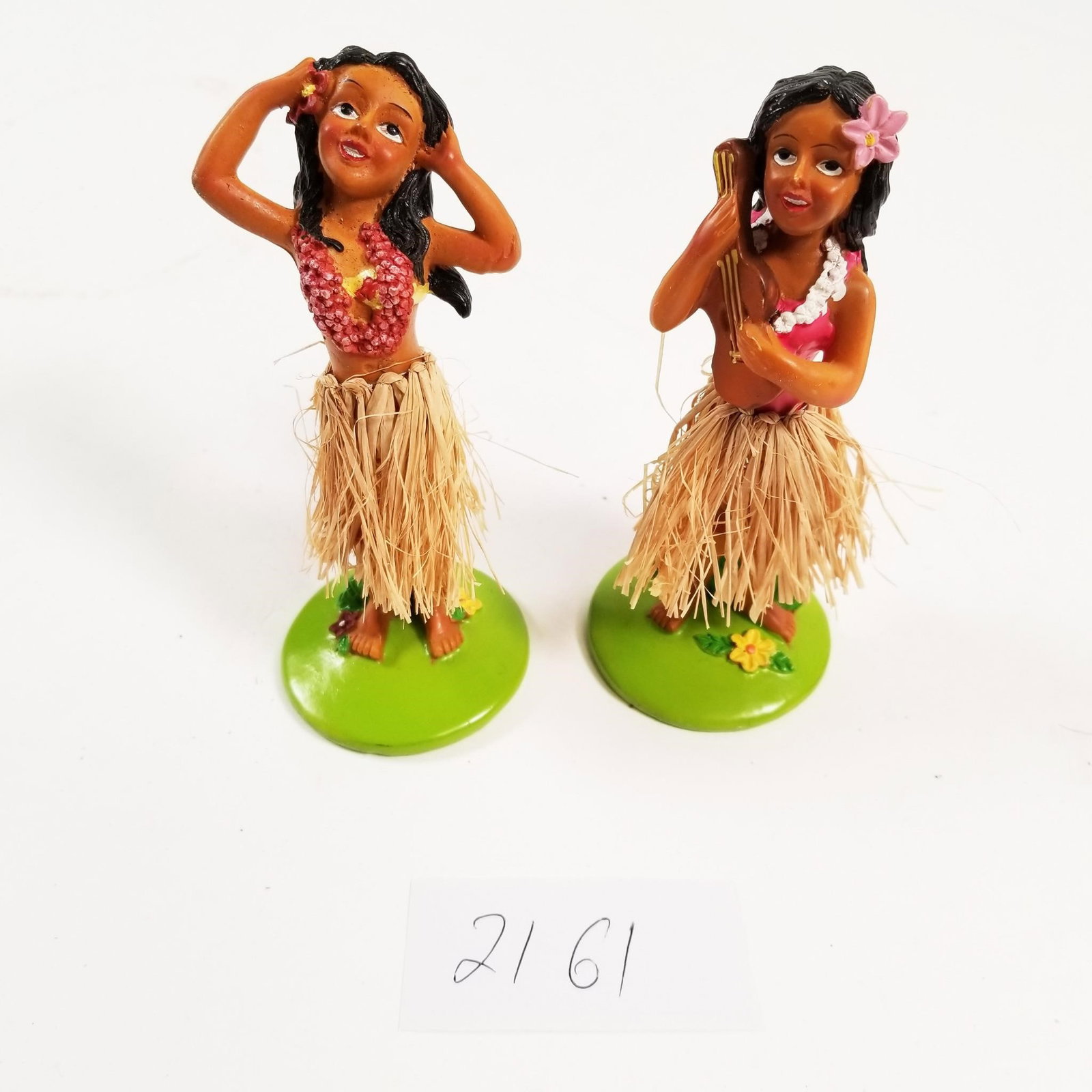 Vintage Collectible Pair of Hawaiian Hula...: Dancer Figurines. Vintage Collectible Pair of Hawaiian Hula Dancer Figurines - Sold as-is, condition varies. See photos for details.