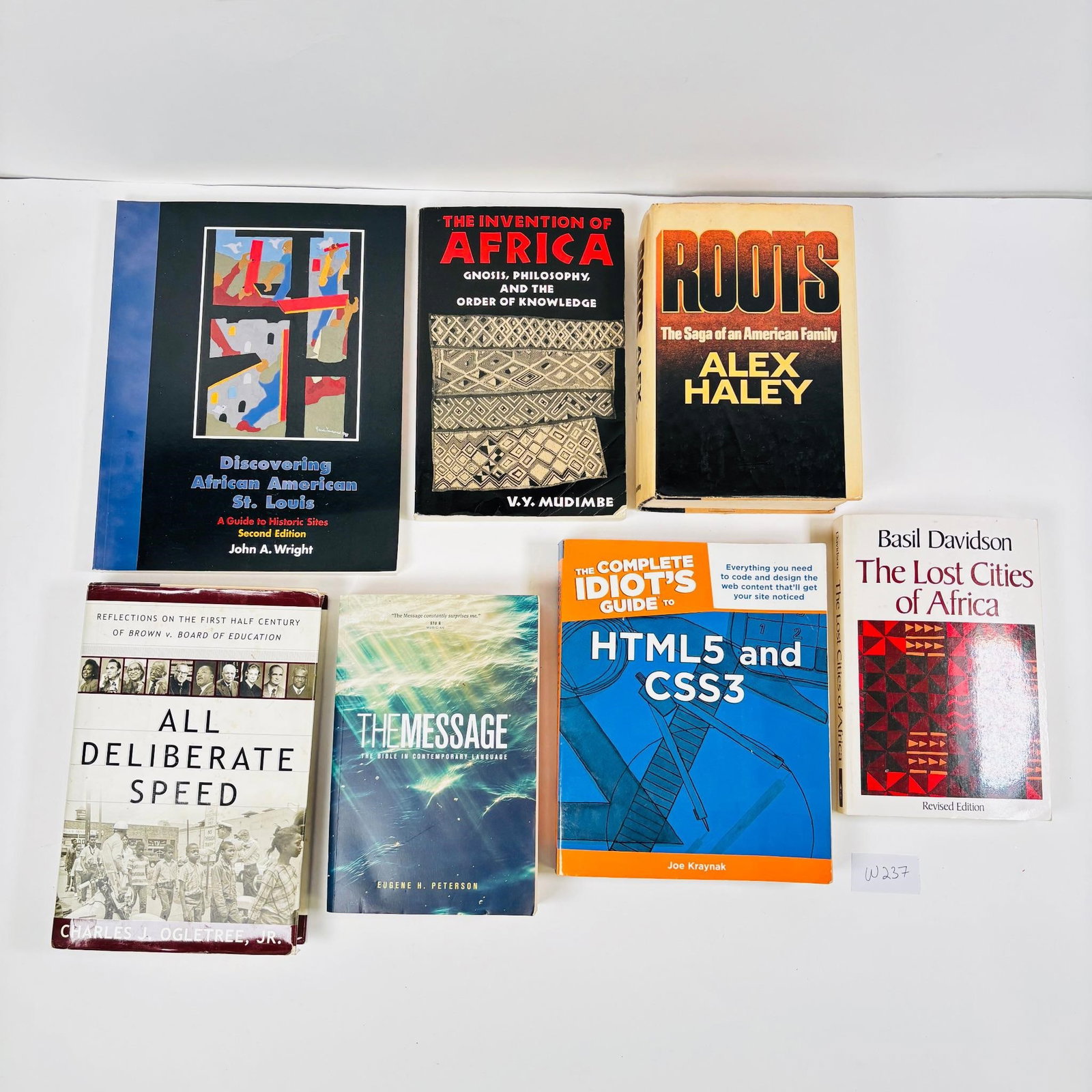Assortment of Books Set of 7 (The Lost Cities...: of Books Set of 7 (The Lost Cities of Africa, Roots, The Invention of Africa and more). This lot features a collection of 7 books, including "The Lost Cities of Africa" by [mention author if known], A