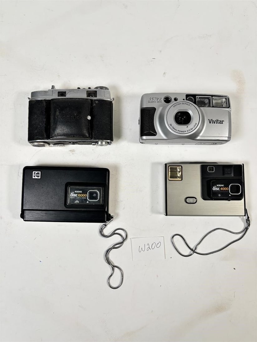Vintage Film Cameras Set of 4 (Vivitar, Kodak): Vintage Film Cameras Set of 4 (Vivitar, Kodak)-Sold as-is, condition varies. See photos for details.