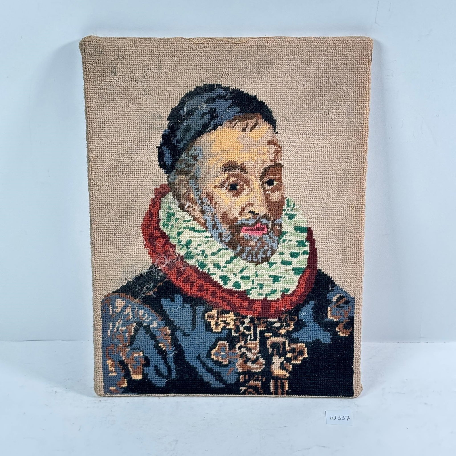 Nobleman Woolwork Piece: Nobleman Woolwork Piece. Features a detailed depiction of a nobleman in handcrafted textile art. Sold as-is, condition varies. See photos for details.