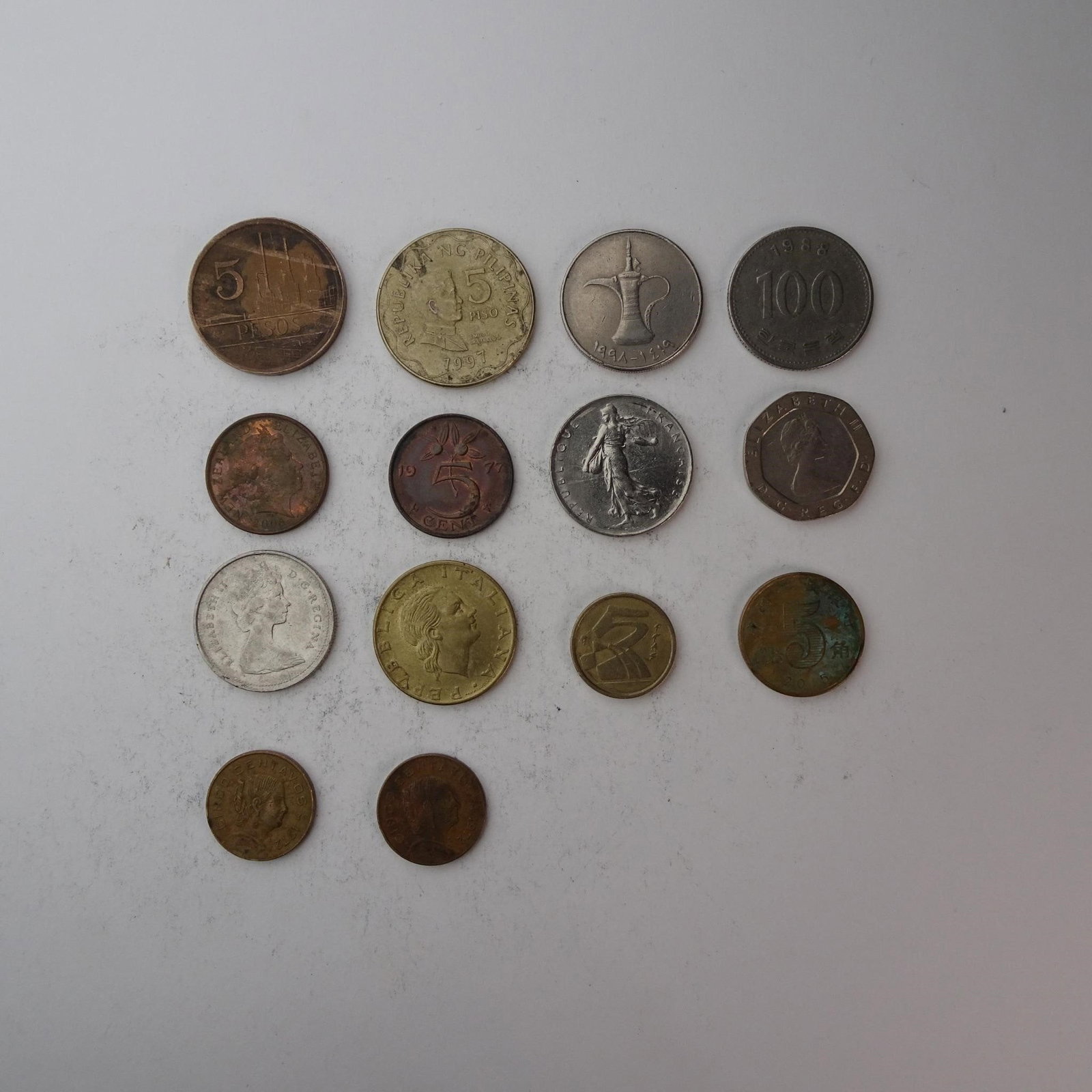 Diverse Assortemnt of International Coins Set...: of International Coins Set of 14 (France, UK, Italy and more). Diverse collection perfect for starting a collection, filling gaps, or for educational purposes. Years and mint marks included in the set