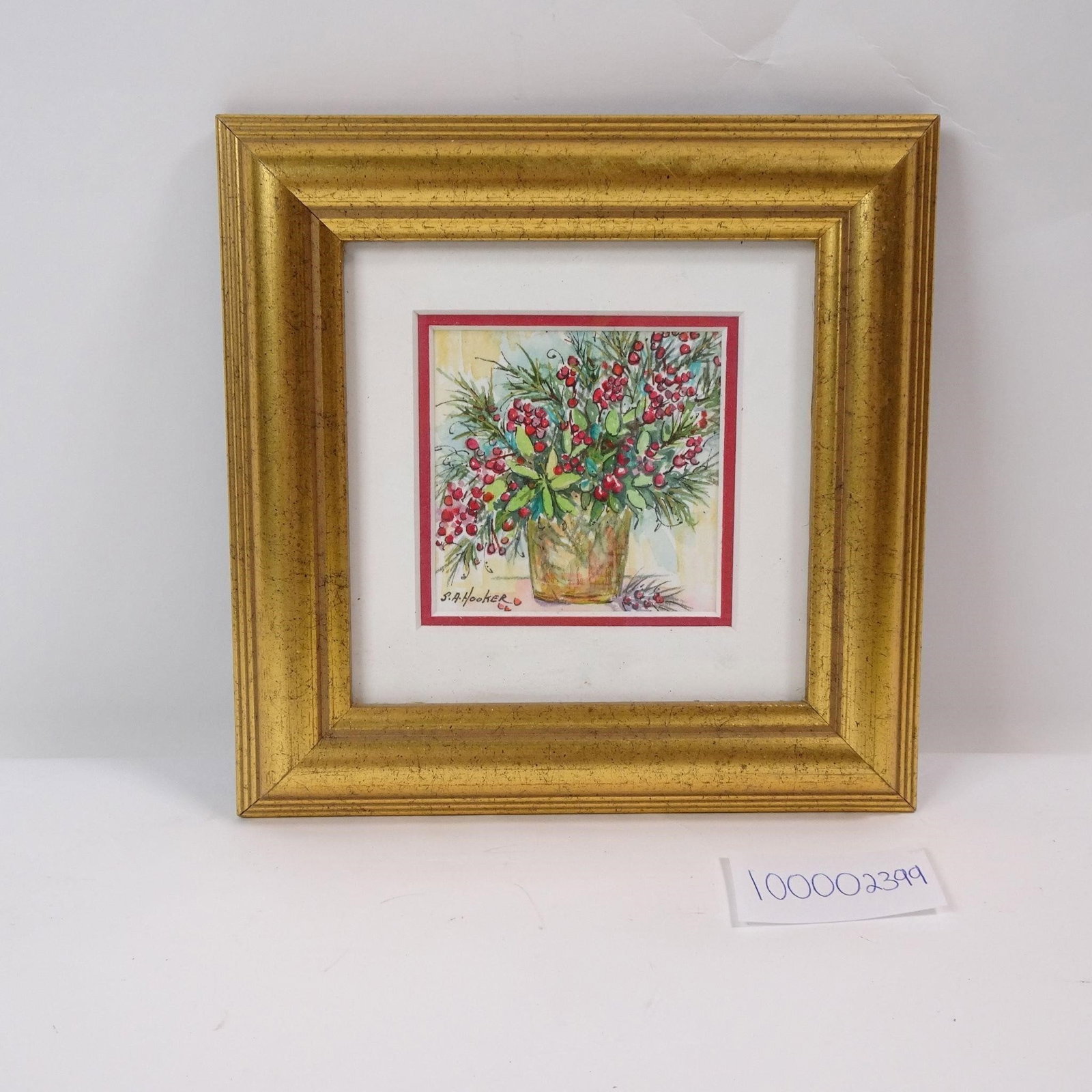 Vintage Christmas Arrangement by S.A. Hooker: Charming vintage holiday artwork by S.A. Hooker, featuring a festive Christmas arrangement. Framed and ready for seasonal display.Condition varies; please refer to photos for details.Sold as-is. No li