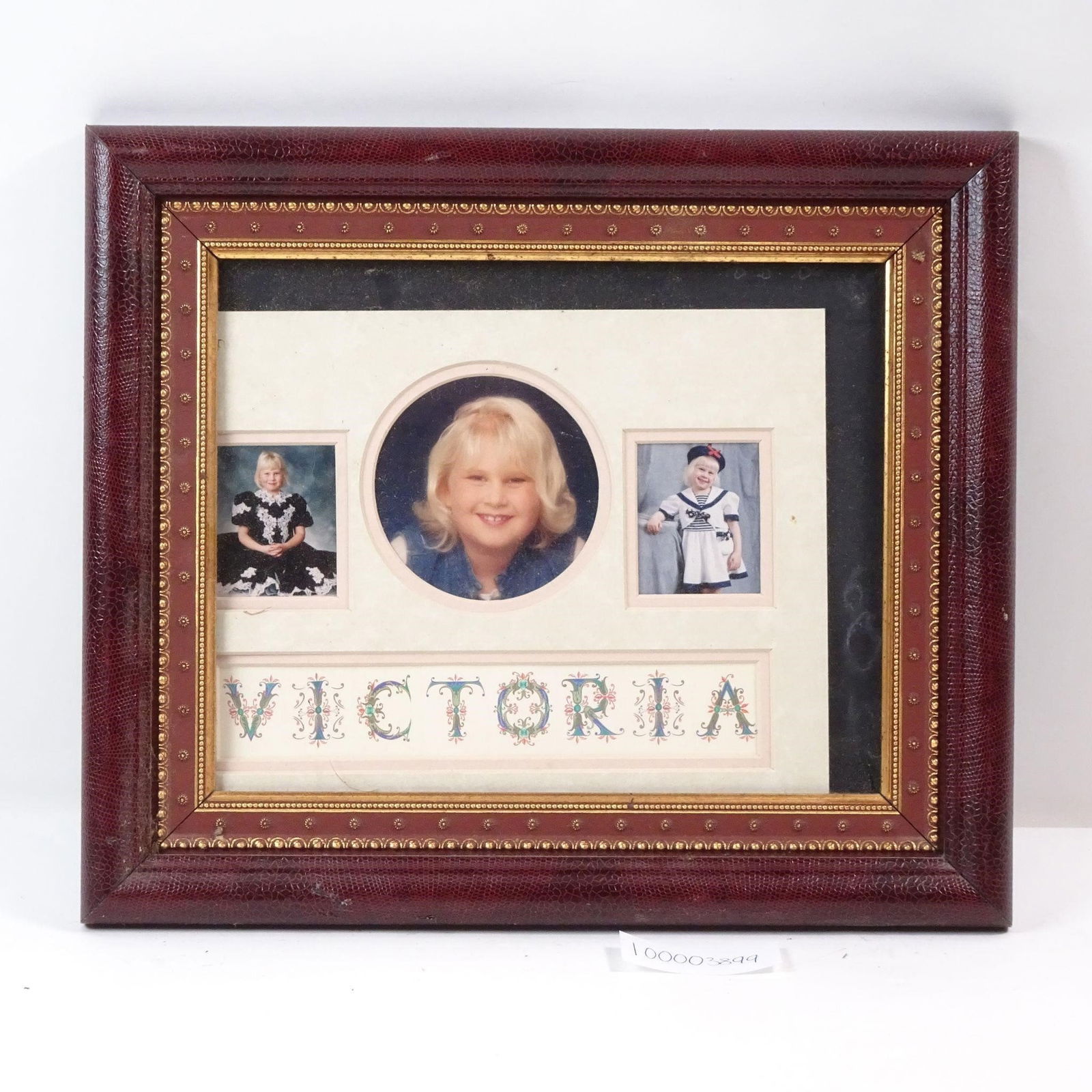 Faux Snake Skin Frame: A decorative frame featuring a striking faux snake skin finish. Its unique, exotic texture adds a bold and glamorous accent, perfect for making a statement in any home décor.Condition varies; please