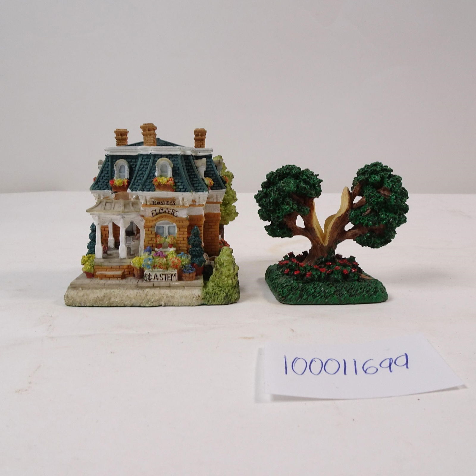 Collectible Liberty Falls "Rosies Flower Shop": Collectible Liberty Falls "Rosie's Flower Shop" miniature building. Detailed craftsmanship with charming small-town design, ideal for display or completing a set. Condition varies; please refer to pho