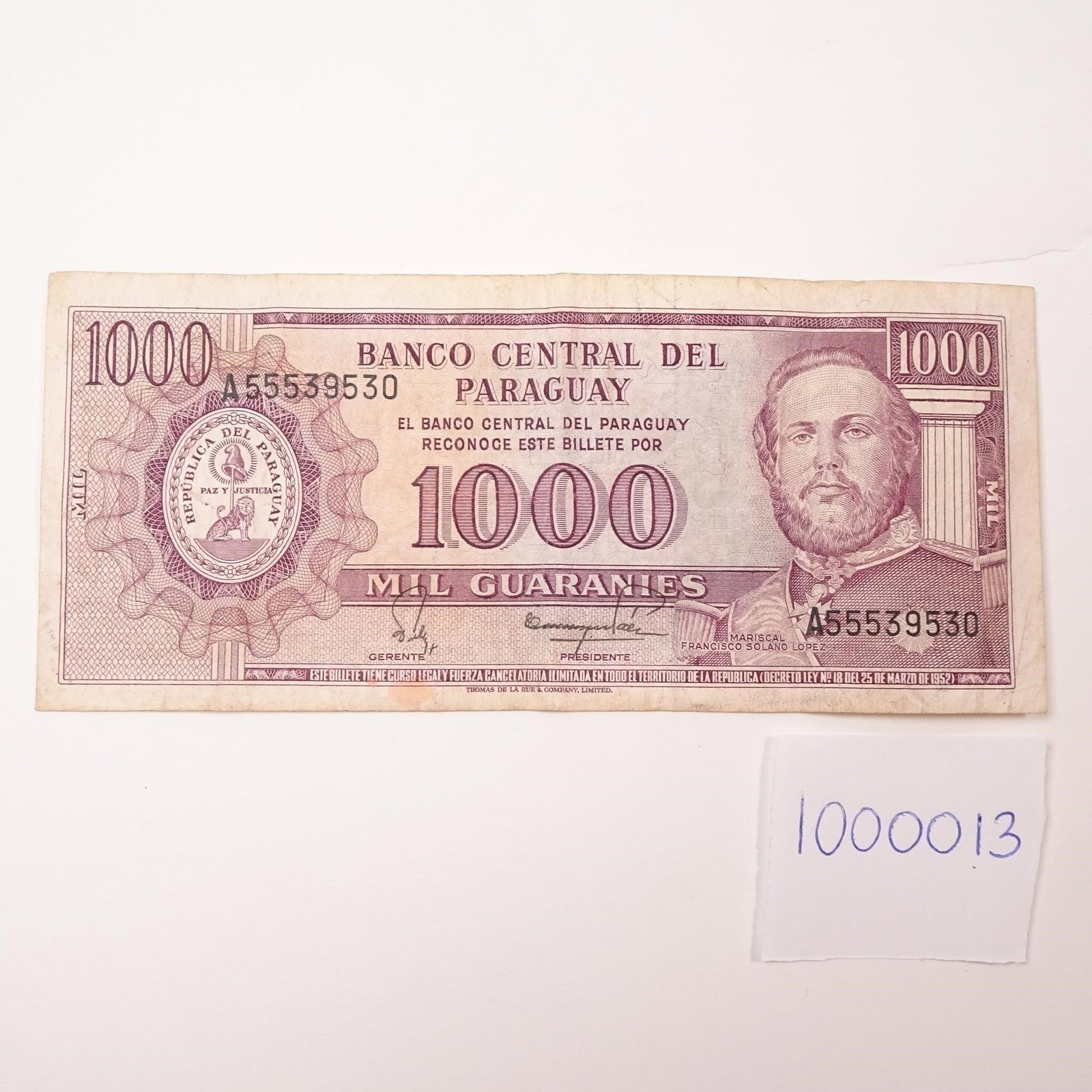 Paraguay 1000Guaranies L.25.3.1952...: SeriesA55539530:. This vintage 1000 Guaraníes note from Paraguay, dated March 25, 1952 (Series A55539530), features classic design elements and national symbolism, making it a valuable piece for curr