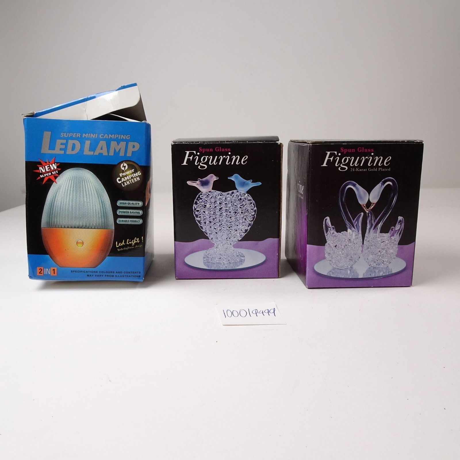 Spun Glass 24k Gold Plated Figurines n LED Lamp: A decorative set featuring delicate spun glass figurines with 24k gold plating, paired with an LED lamp for a stunning display. This unique collection is perfect for collectors of glass art or for add