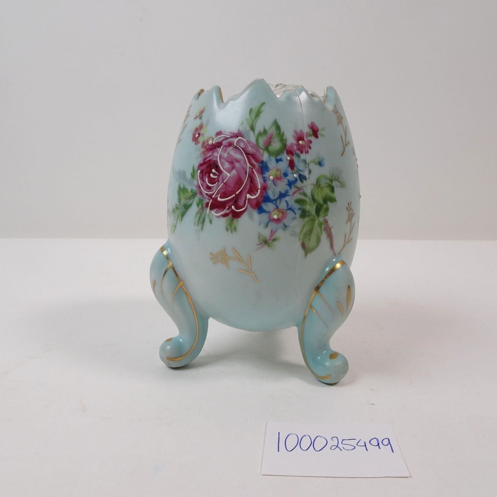 Vintage Napcoware Cracked Egg Vase Light Blue: A charming vintage Napcoware vase featuring a whimsical light blue cracked egg design. This delightful piece is perfect for collectors of vintage ceramics or for adding a touch of nostalgic charm and