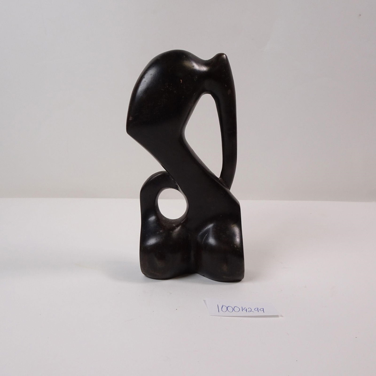 Abstract Wooden Figure: Abstract wooden figure. Hand-carved design with natural wood finish, ideal for artistic display or collection. Condition varies; please refer to photos for details.Sold as-is. No liability assumed. Pl