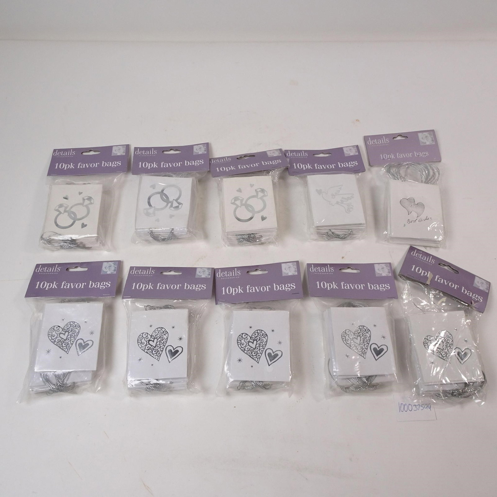 New Favor Bags packed in 10 -Set of 10: A new bulk lot of favor bags, packed in sets of 10 for a total of 100 bags. This large quantity is perfect for weddings, parties, or special events, offering a convenient and stylish way to package gi