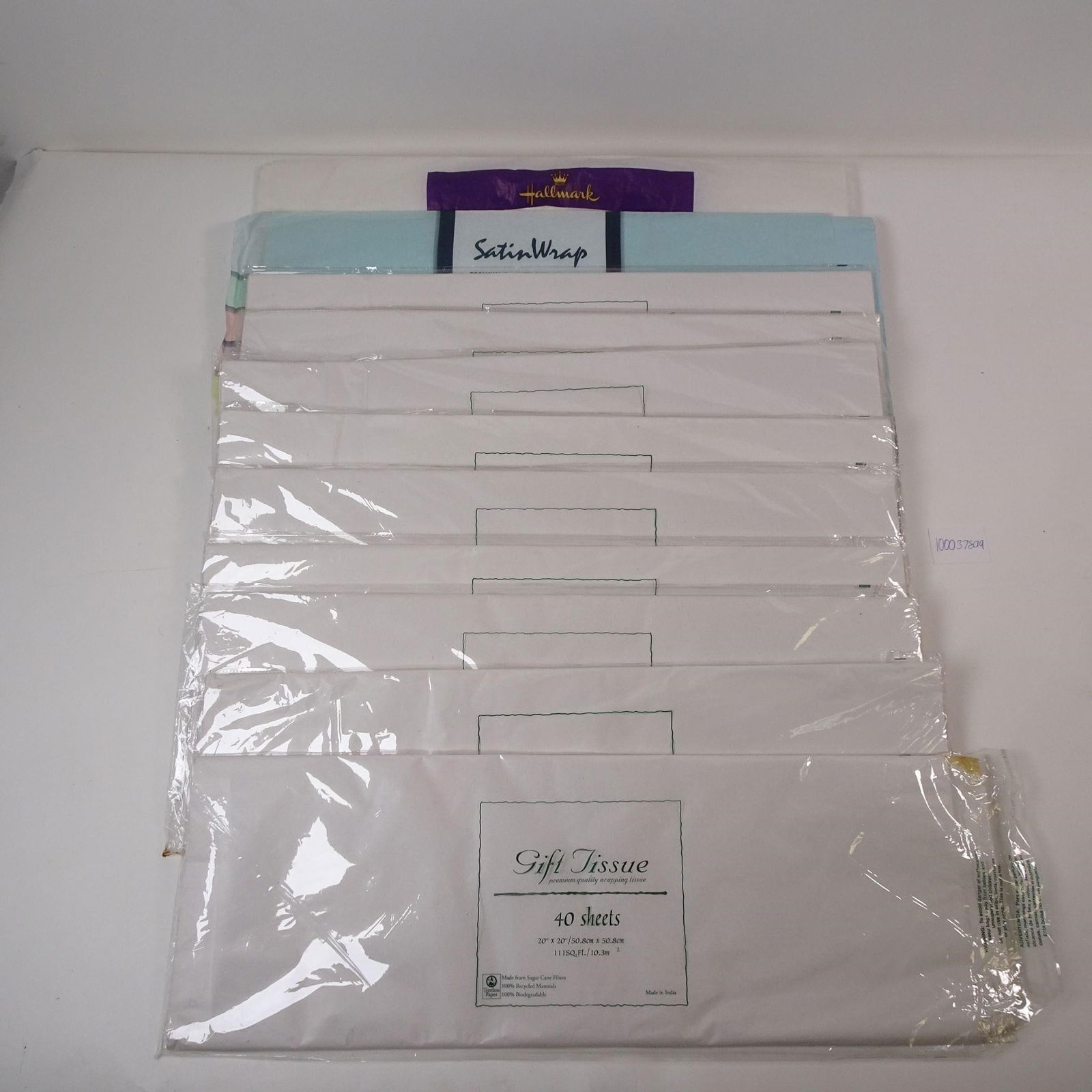 New Gift Tissue Paper in White Set of 10: A set of 10 packs of new white gift tissue paper, perfect for gift wrapping, crafts, or stuffing gift bags. This bulk collection is ideal for various occasions, offering a clean, classic, and essentia