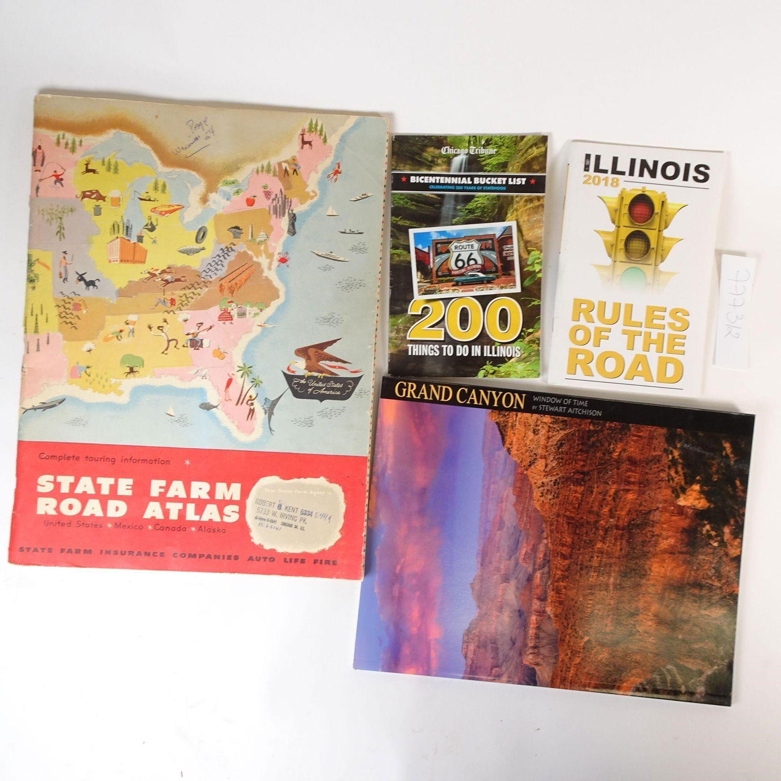 Vintage & Modern Travel Lot: This lot includes a curated selection of travel and road-themed publications focused on the United States, with a strong emphasis on Illinois and classic American road culture. A great mix of vintage