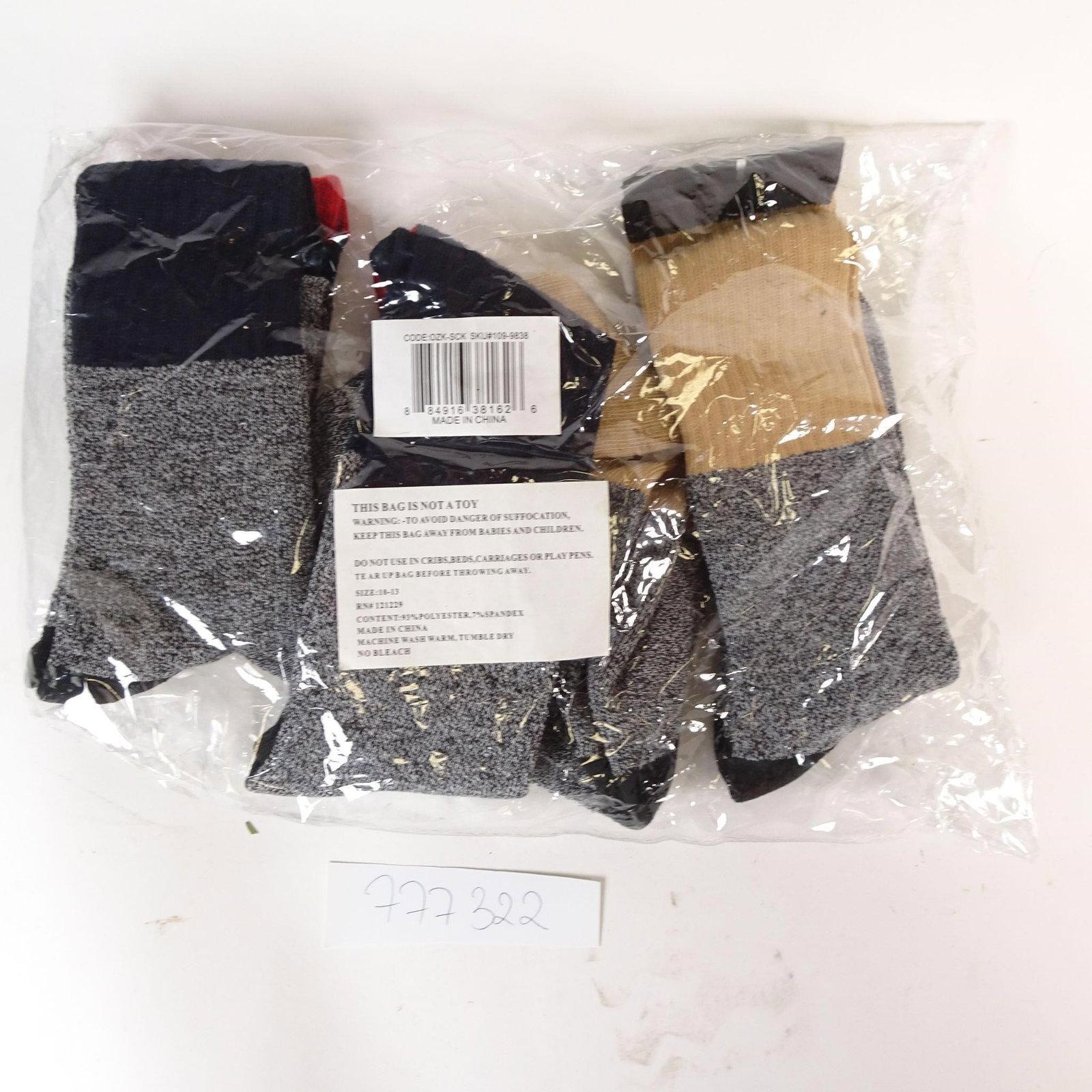Lot of 4 Pairs Men's Crew Socks: This lot includes four (4) pairs of men's crew socks, new and originally packaged. Socks feature a classic, practical design suitable for everyday wear. Details: - Quantity: 4 pairs (8 socks total) - 
