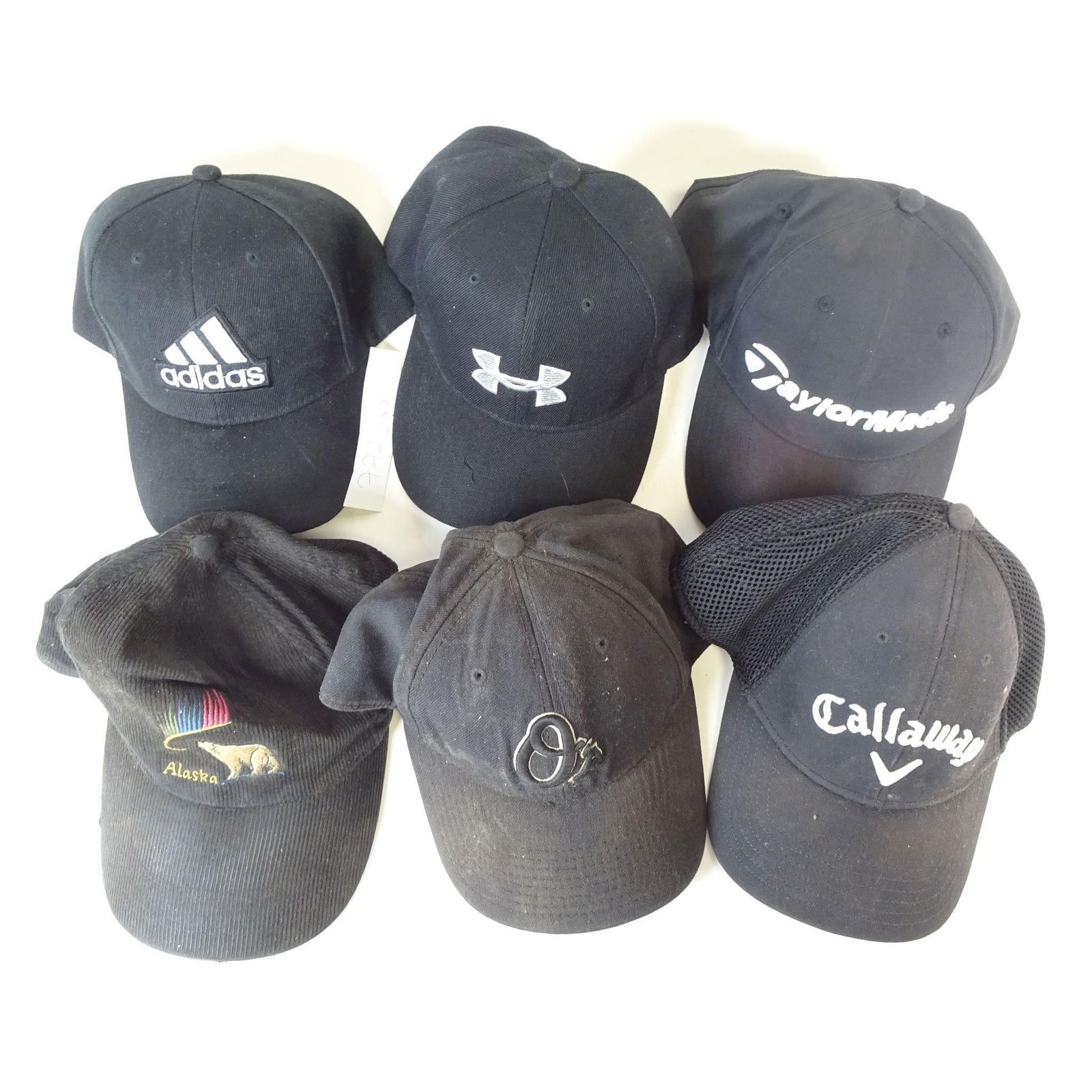 Lot of 6 Branded Baseball Caps: This auction features a mixed lot of 6 branded baseball caps, sold together as one lot. Included brands and styles: - Adidas - Under Armour - TaylorMade - Callaway - Additional casual / outdoor styles