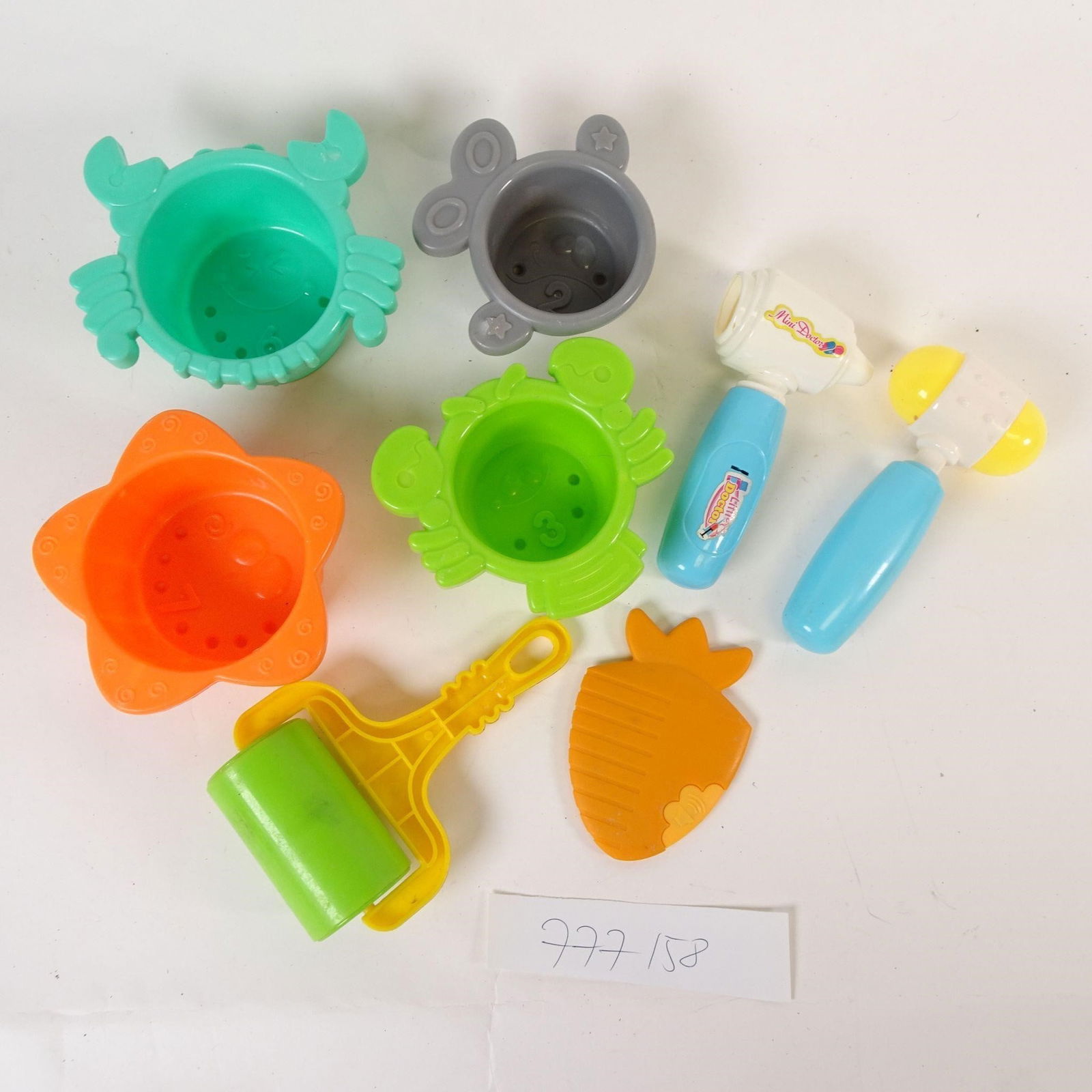 Children's Sand & Water Toys Set: For sale is a children's sand and water toy set. All items are made of plastic and are in good pre-owned condition, showing normal signs of use. Perfect for sandbox, beach, or water play.